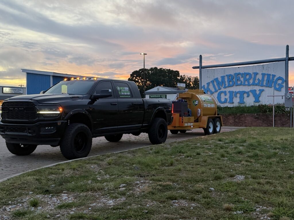 NextGen Pavement Solutions truck and sealcoating rig in Kimberling City, Missouri