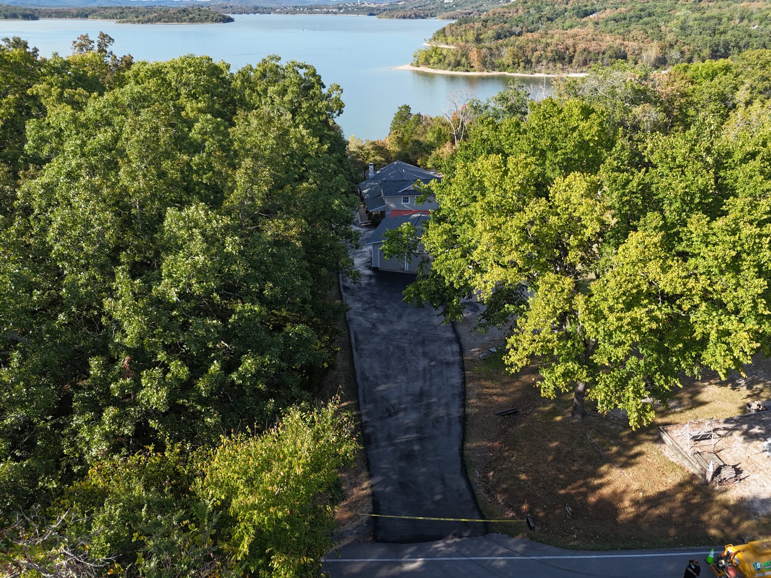 Aerial view of the coated driveway and house in Kimberling City