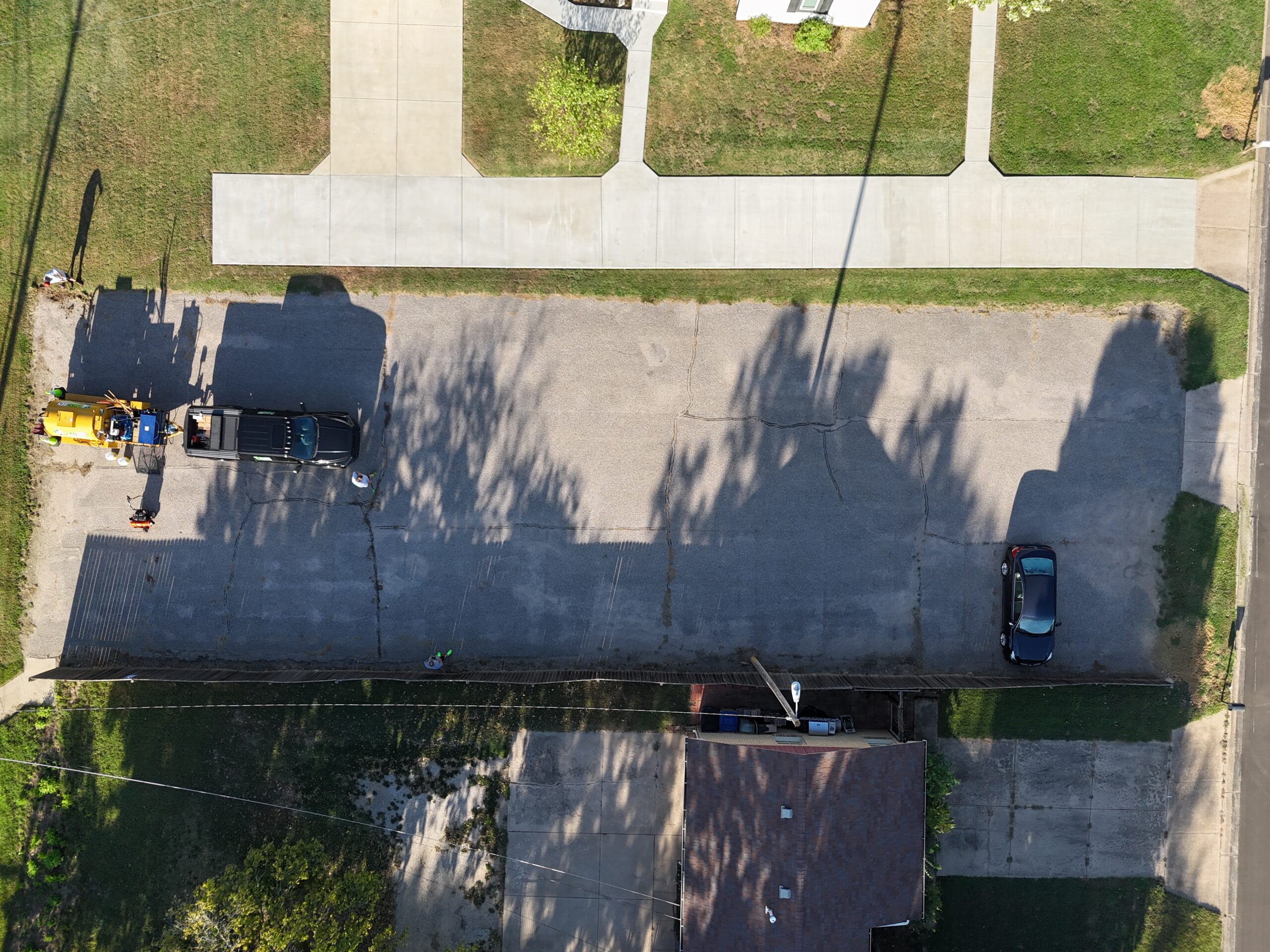 September 15 aerial of the Grace Communion Derby parking lot before the later sealcoating progress
