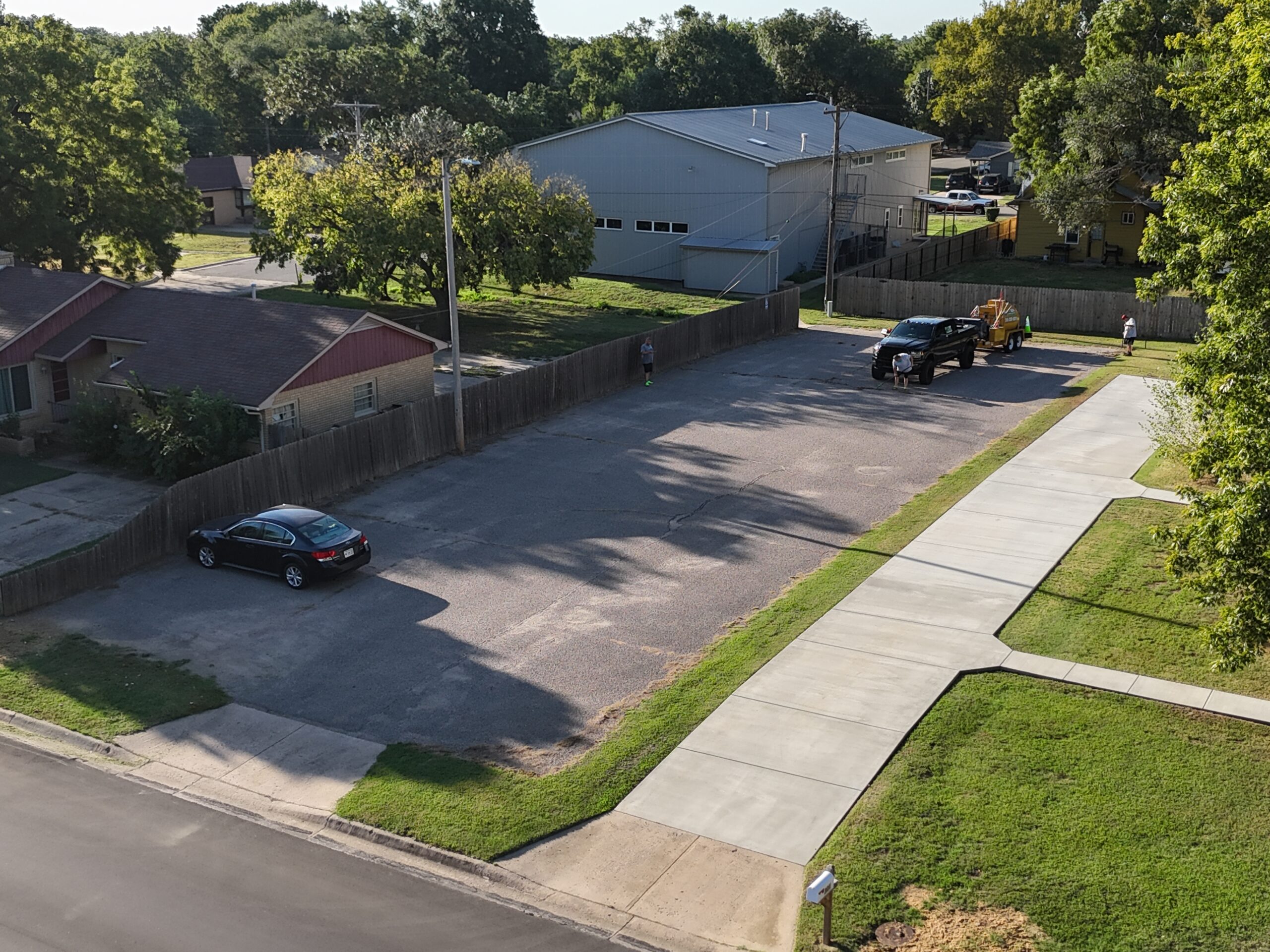 Early cleaning stage at Grace Communion Derby church parking lot in Derby, Kansas