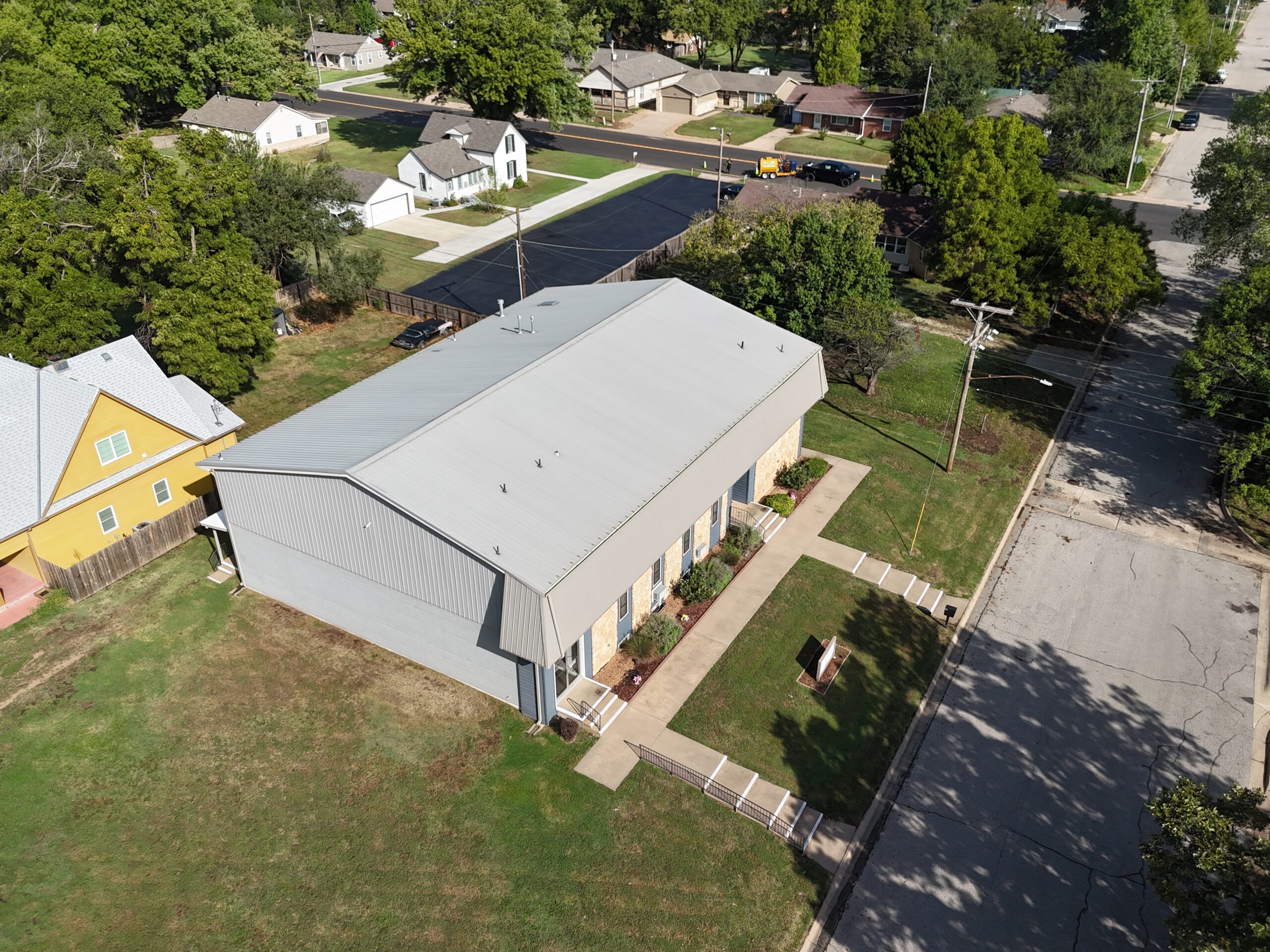 September 16 wider aerial of Grace Communion Derby church and its parking lot before new striping